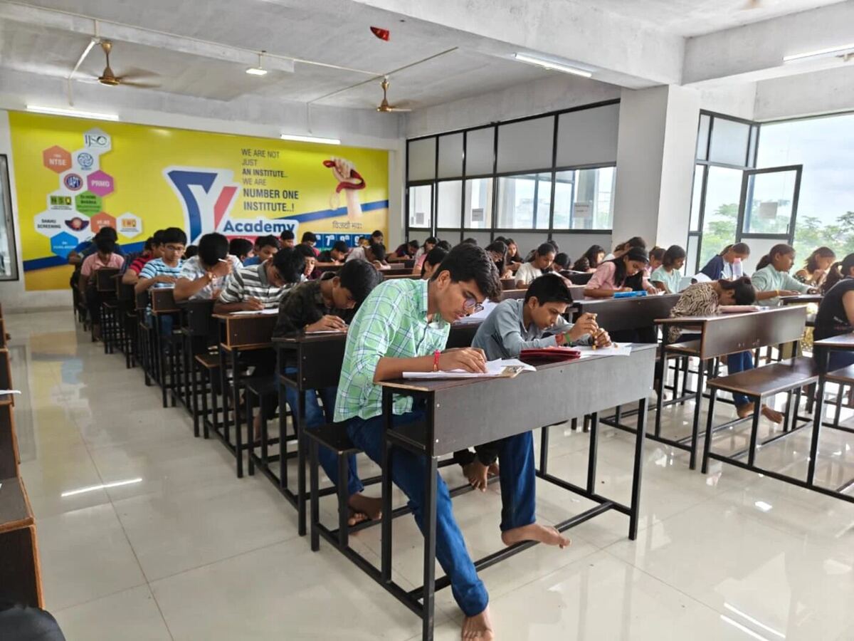 Students taking a test in a Y Academy classroom in Latur